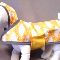 The reverse of the Raincoat is clouds and raindrops - adorable on your little dog.