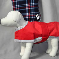 The reversible Blanket Coat will keep your little dog warm and dry.