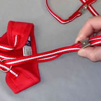 Showing the pinch adjuster of the EasyGo Harness for small dogs. Easy to use.