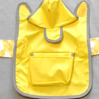 The Reversible Raincoat for small dogs laid flat to see the construction.