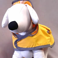 You can see the wide neck strap on the Reversible Raincoat for little dogs.