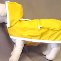 The reflective trim on the Reversible Raincoat for little dogs goes all the way around and is on both sides.