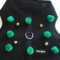 Pompoms and bells decorating your little dog's Wrap-N-Go Harness!