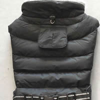 Your little dog will stay dry in the Puffer Coat - there's a flap over the opening for the leash ring!